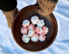 classic round wooden bowl shown with peppermint treats in a Vermont winter setting