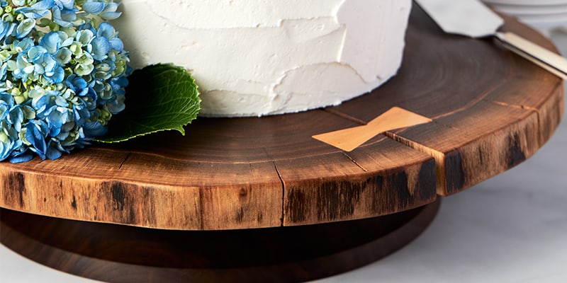  Great wedding gifts like this rustic wooden wedding cake stand from Andrew Pearce Bowls in Hartland VT shown in walnut with a white wedding cake