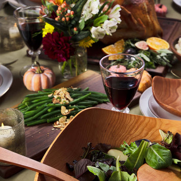 Holiday table setting with wooden bowls