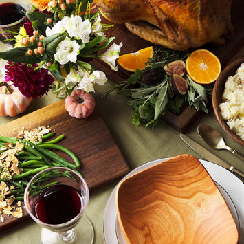 Thanksgiving table settings with wooden bowls